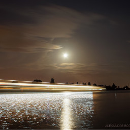 night nightphotography lighttrail river moon