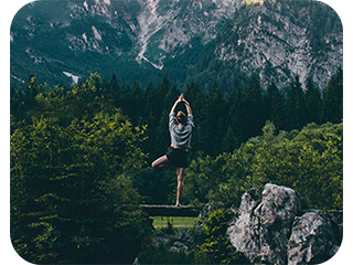a yoga girl in an amazing nature