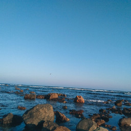 myphto sea stones sunset tide